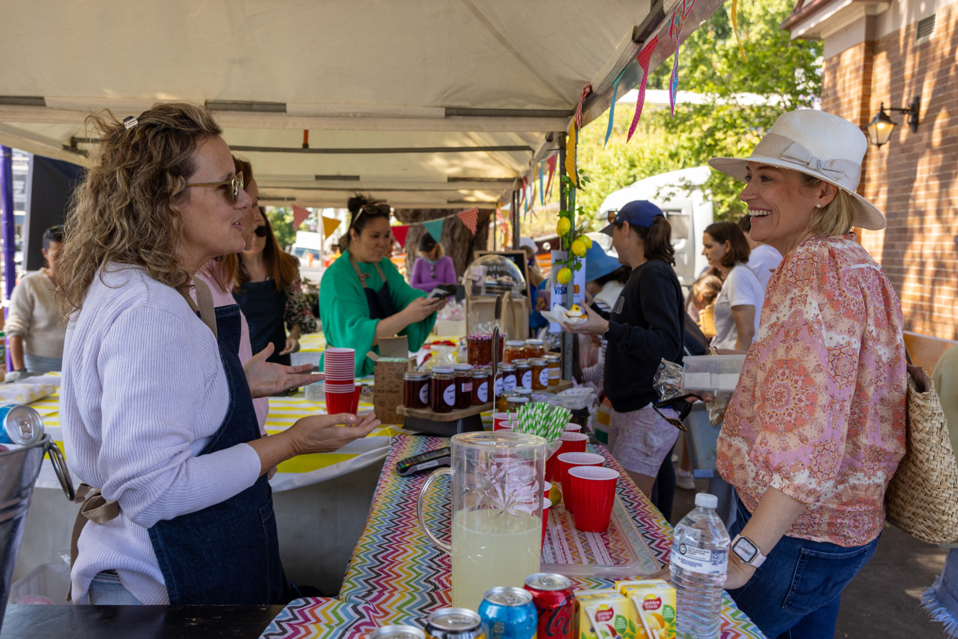 Volunteers serving customers at the St Thomas bake stall