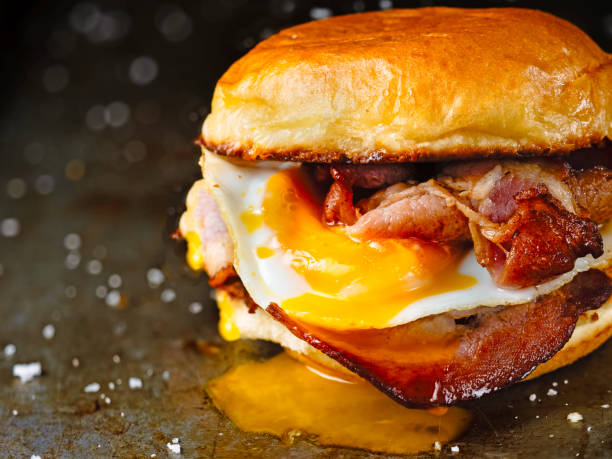 Bacon and egg roll with a runny yolk