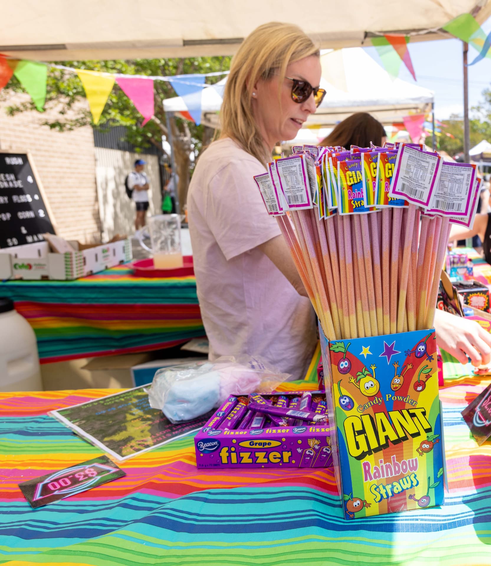 Colourful lollies, rainbow straws and treats on the Sugar Rush stall