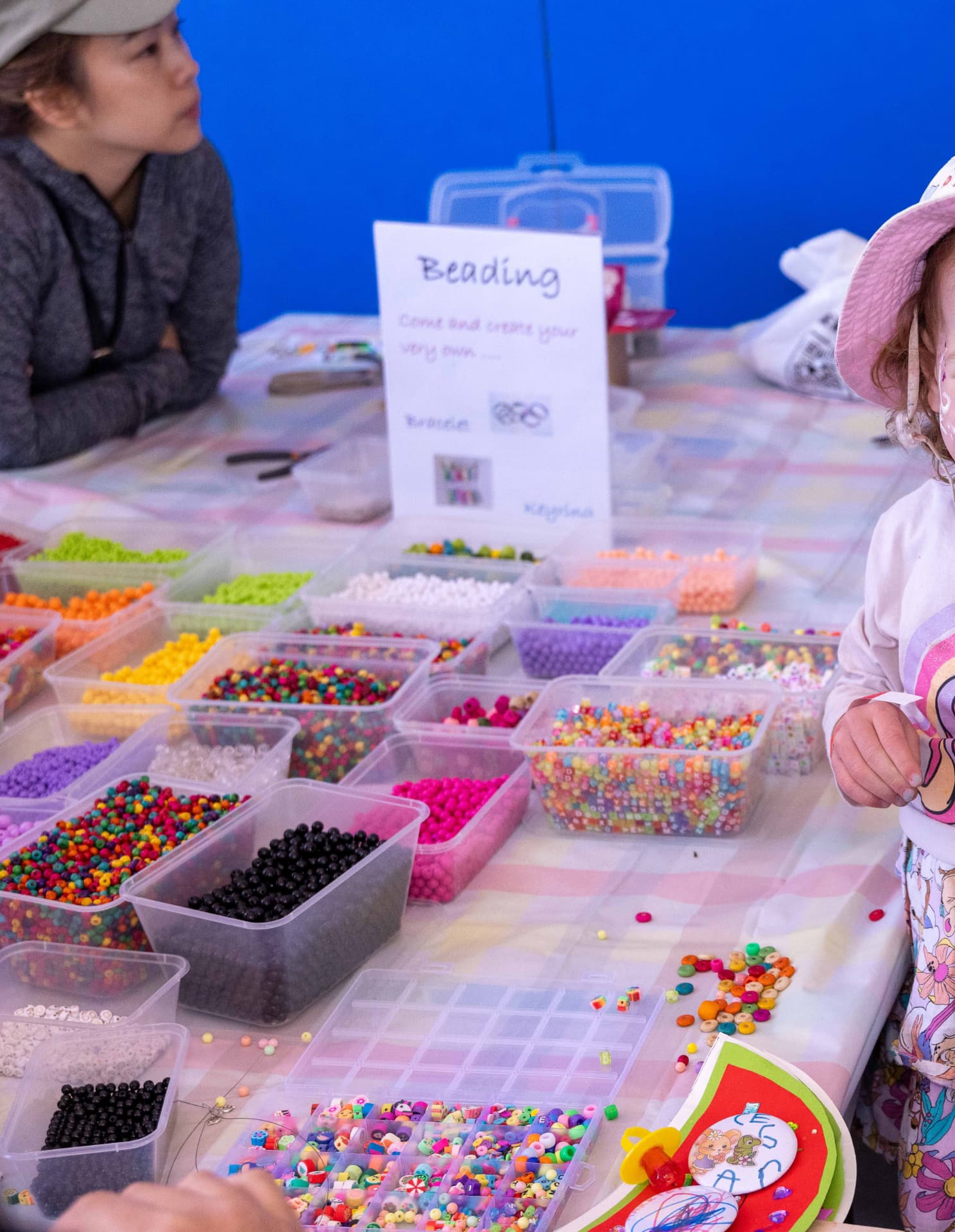 Colourful beads and jewellery supplies at the kids craft beading table